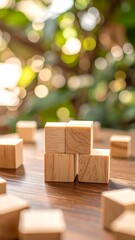 Wooden blocks on table, nature background