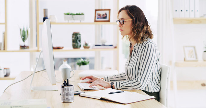 Computer, reading and business woman in office for email, risk management or insurance policy. Desktop, typing and serious broker online at workplace for financial coverage, research or underwriting