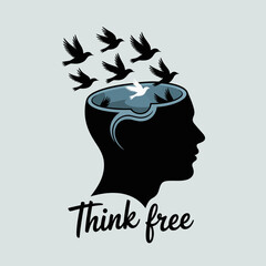 Silhouette of a human head with birds flying out of an open mind symbolizing freedom of thought and creativity © Ultimate