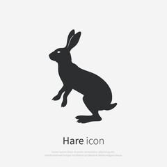 Fototapeta premium Bunny icon silhouette. Black hare logo isolated on white background. Vector illustration
