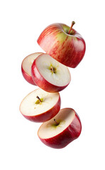 Falling sliced red apples in a visually appealing food arrangement on white