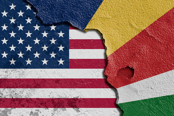Fototapeta premium Torn Flags of United State Of America (USA) and Seychelles Depicting Political and Cultural Tension. Split Design of Seychelles and United State Of America (USA) Flags on Textured Surface.