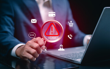 Scam Alert Warning with Cybersecurity Icons. A person holding magnifying glass highlighting warning sign for scams with icons representing online threats, phishing, and cybersecurity. Unknown person,