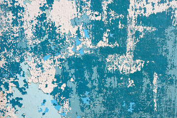 Abstract background, Old cracked blue and white paint on a wooden surface.