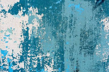 Abstract background, Old cracked blue and white paint on a wooden surface.