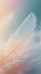 Obraz premium Soft White Feather Against a Pastel Gradient Background
