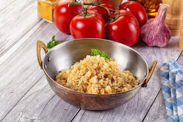 Vegan cuisine - boiled bulgur garnish