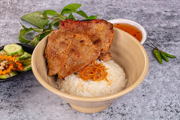 Roasted pork steak with rice