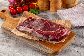 Gourmet raw rib eye steak