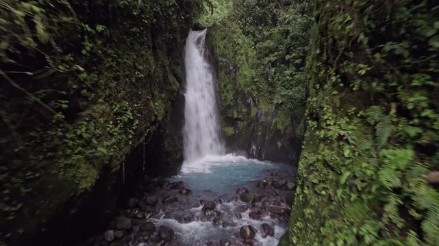 This aerial shot captures the unique beauty of Cataratas Las Gemelas (The Twin Waterfalls) in the Bajos del Toro region of Costa Rica.