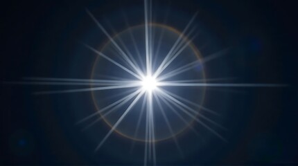 Obraz premium Bright Starburst Light with Radiating Rays and Circular Halo on Dark Background