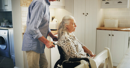 Morning, relax and wheelchair with old couple in kitchen of home together for support or wellness. Love, retirement and senior man pushing woman with disability in apartment for assistance or help