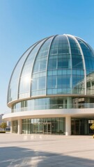 Modern Building with Glass Dome and Curved Facade