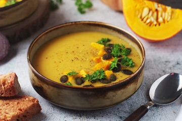 Bowls served with seasonal pumpkin soup	