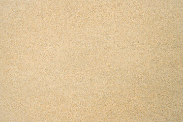Close-up of fine golden sand on a beach along the Atlantic coast. A subtle natural background.

