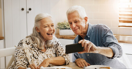 Happy, old couple and selfie in kitchen, bonding or memory on social media, love or profile picture. Photography, senior man and smile with elderly woman in home, retirement or commitment in marriage