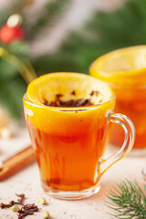 Black tea brewed in orange zest. Citrus hot drink