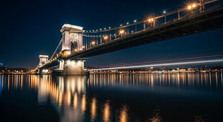 Fototapeta premium Illuminated Széchenyi Chain Bridge at night in Budapest, Hungary.