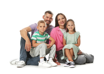 Lovely family posing together on white background
