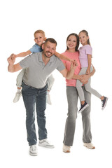 Fototapeta premium Happy family having fun on white background