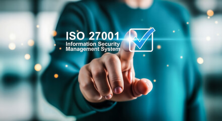 Iso 27001 information security management system certification concept with a person touching a screen with a checkmark