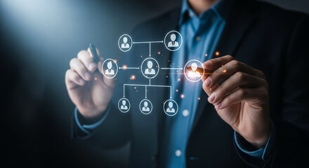 Building Connections: A close-up view of a person in a suit drawing a network diagram with a digital pen. representing the essence of teamwork and communication.