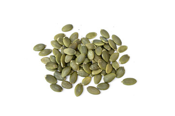 Ready to eat healthy snacks. Pile of Roasted pumpkin seeds peeled unsalted isolated on white background.