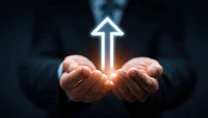 Business hands holding an upward arrow