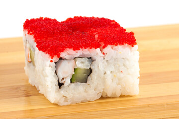 Delicious Sushi Roll Creativity with a Colorful Topping of Red Fish Roe