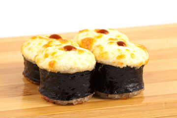 Delicious Cheese Sushi Rolls Arranged Beautifully on Wooden Platter