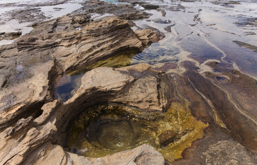 Gran Canaria, textures of the rocks of El Confital beach on the edge of Las Palmas de Gran Canaria, low tide