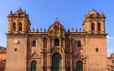 Historic Cusco Cathedral under a clear sky.