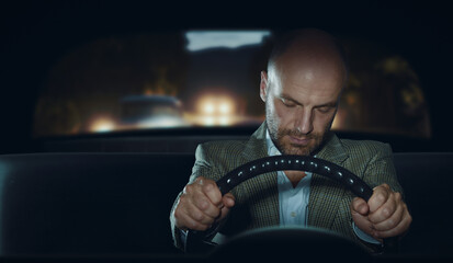 Fototapeta na wymiar Man falling asleep while driving his car