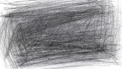 Abstract scribble area forming on white drawing surface, with dense overlapping black strokes