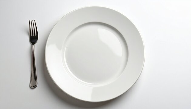 isolated empty plate on white background top view