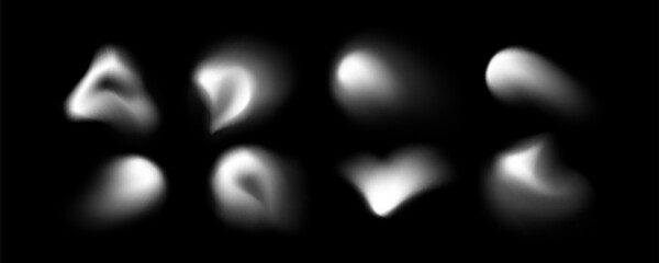 Blur shape blob collection with soft white gradient forms on black background for abstract design and overlay effects. Smooth organic modern elements with diffused blurry edges and glowing spots © klyaksun