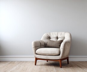 A light-filled room showcases a comfortable, light beige armchair with a rich taupe pillow, set against a neutral backdrop.