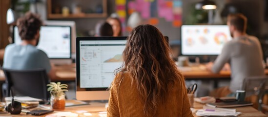 Team working at computers in an office