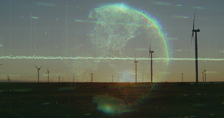 Displaying digital globe hologram hovering over wind turbines at dusk, with data points, code lines