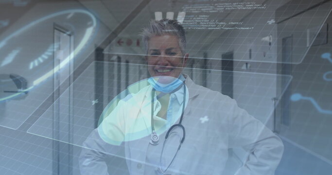 Standing doctor in lab coat analyzing digital overlays in hospital corridor, with stethoscope, mask - Powered by Adobe
