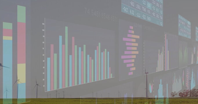 Rotating wind turbines at grassy plain wind farm, with bar charts, pie charts, numeric tables