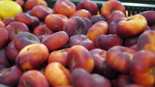 Bountiful heap of fresh, ripe peaches captured in sharp detail, showcasing natural abundance and summer harvest. Perfect for food blogs, farm promotions, or healthy eating content.