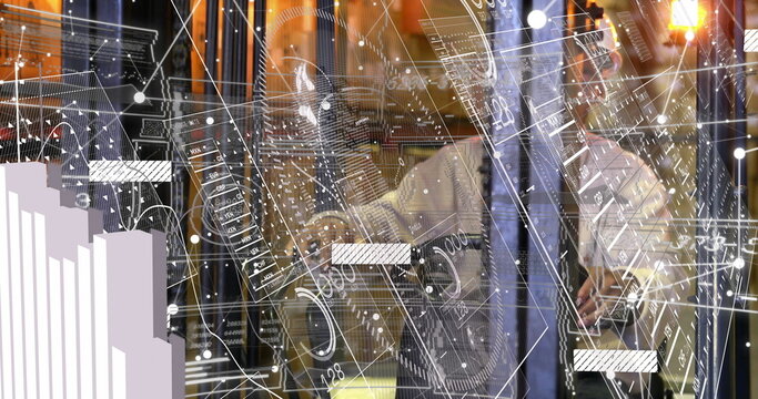 Technician in shirt and tie inspecting server racks in data center, with cables and schematics