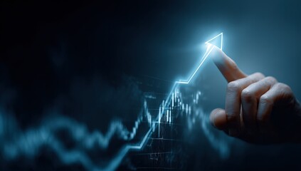 Hand pointing at a rising graph