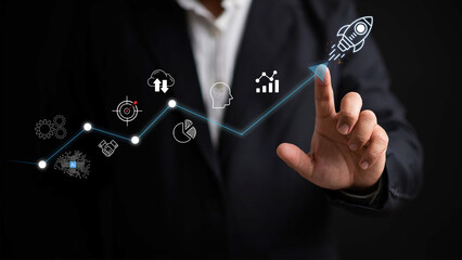 Businessman touch rocket launch investment growth, planning and starting corporate business start...