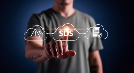 Man using a cloud-based system for SDS (Safety Data Sheet) management and hazard communication.