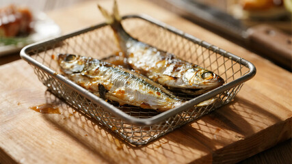 Grilled fish. Fish grilled on a net. Charcoal fire.