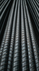Close-up of newly manufactured construction rebar with textured surface
