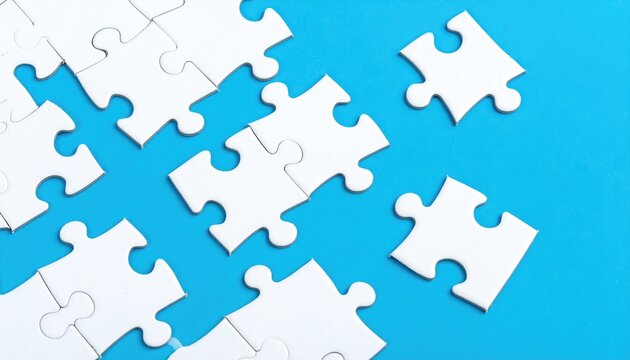 A collection of white puzzle pieces are scattered on a bright blue background, some connected, others floating apart, suggesting incomplete or missing solutions