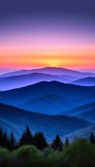 Obraz premium Serene Mountain Range at Twilight, Peaks Silhouetted Against a Colorful Sunset Sky at Dusk